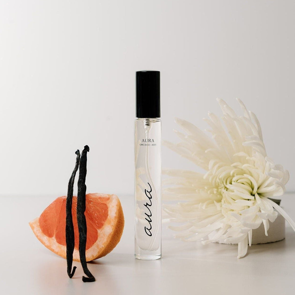 Perfume AURA en spray de viaje