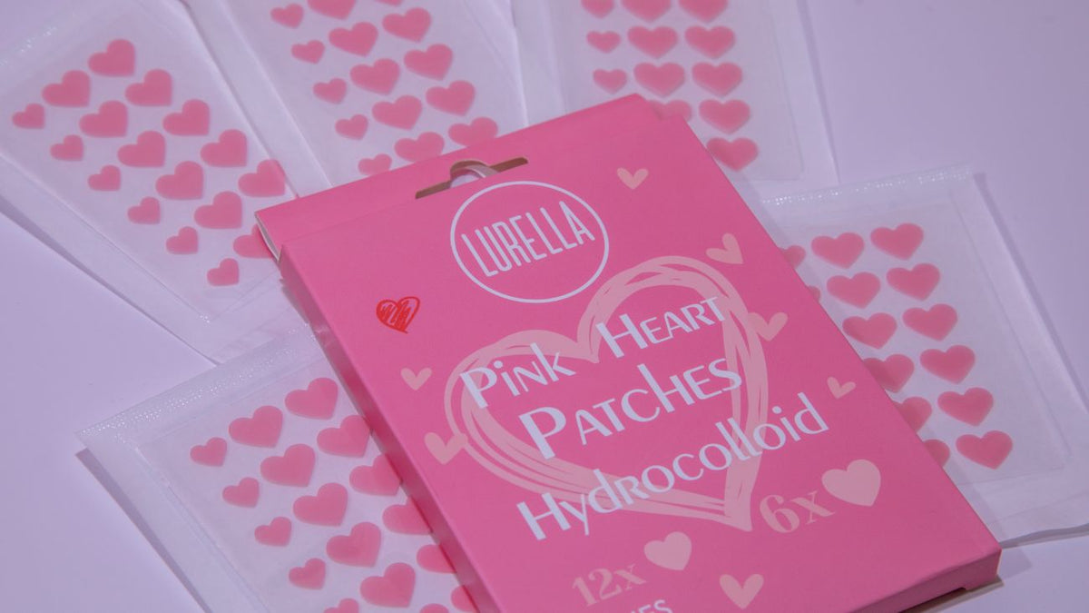 Parches para granos con forma de corazón rosa