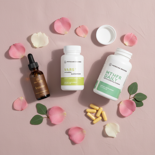 Femme Topical Progesterone Serum, VARS Liposomal Glutathione and MTHFR Daily Hormonal Balance and Skin Stack flat lay — three products with rose petals and green leaves on blush pink background — Physician Designed women's wellness bundle