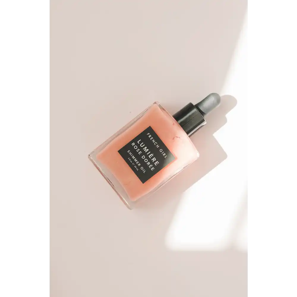Aceite brillante de oro rosa