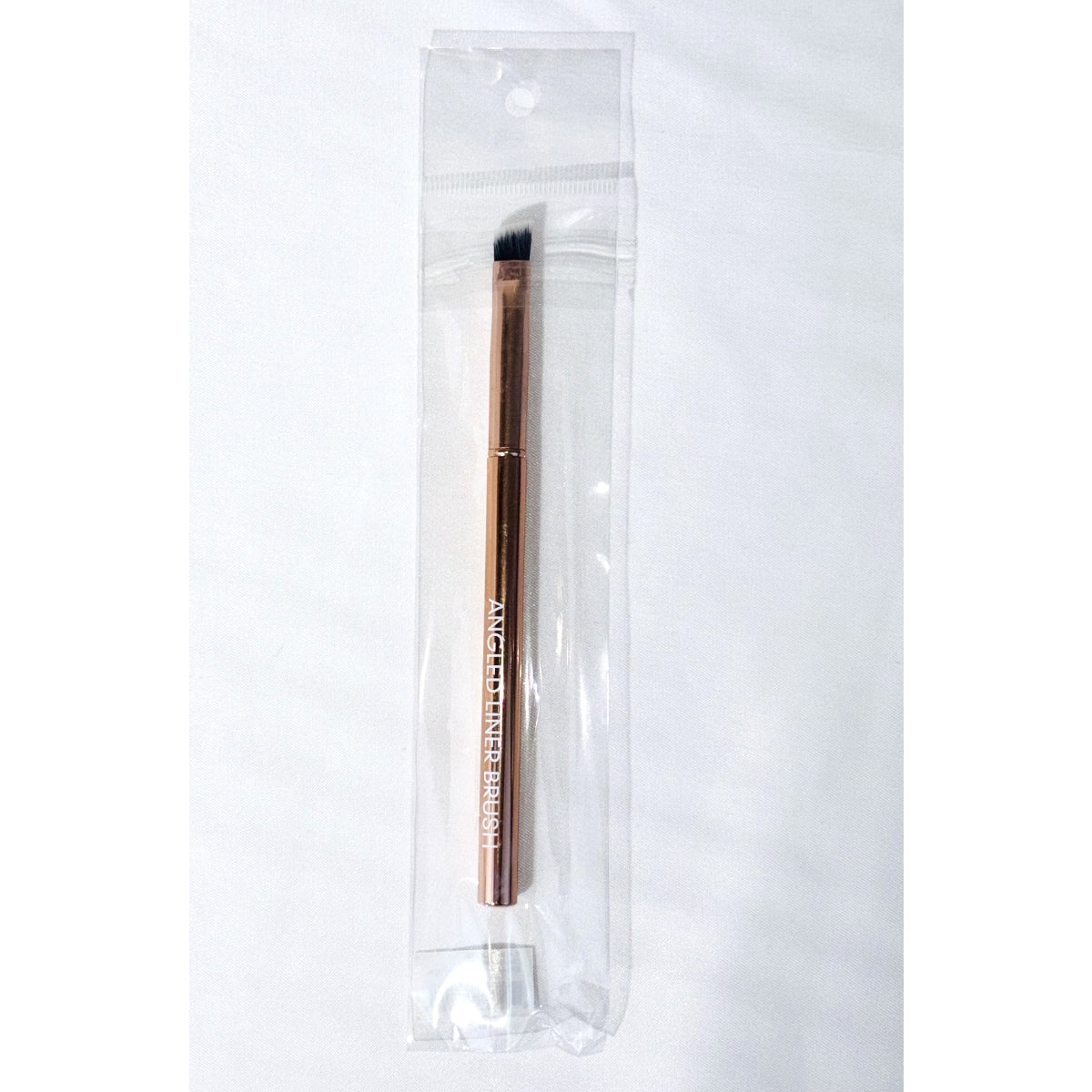 Pincel delineador angular de oro rosa