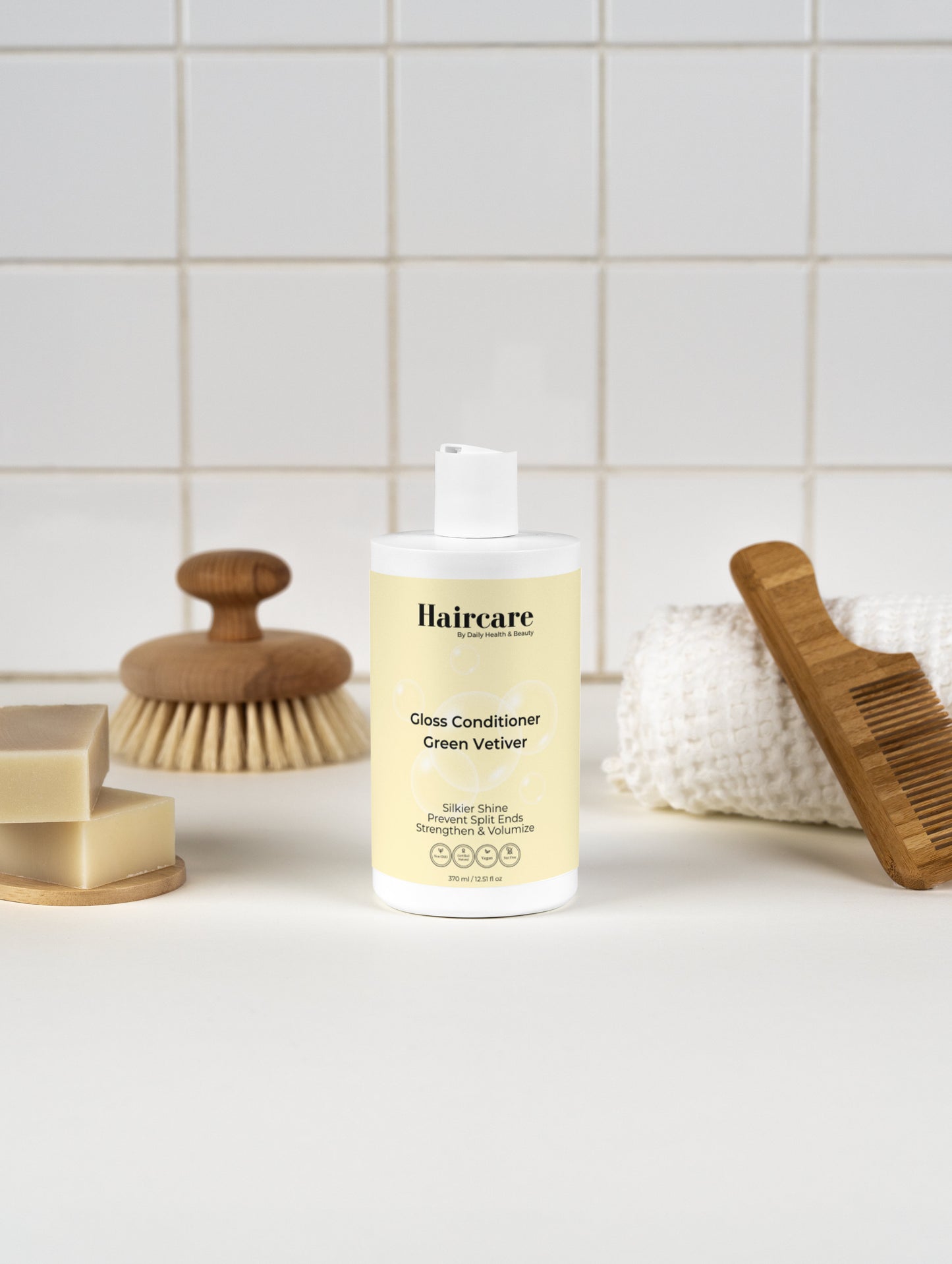 Gloss Conditioner Smoky Green Vetiver in bathroom — earthy vetiver scent, salon-quality conditioning for all hair types
