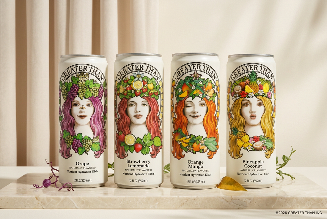  Four Greater Than cans in Grape, Strawberry Lemonade, Orange Mango, and Pineapple Coconut, featuring Claudia Hammer’s illustrated women and fruit artwork on a cream surface.