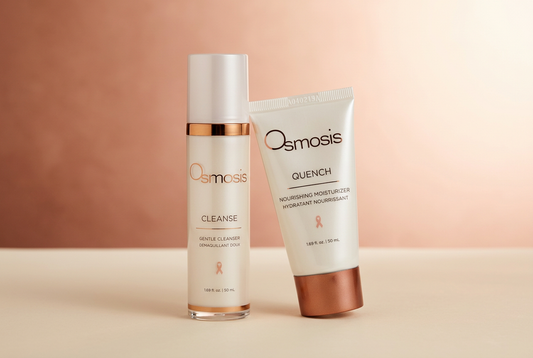 Osmosis Cleanse cleanser and Quench moisturizer arranged on an ivory surface against a soft copper-rose background.
