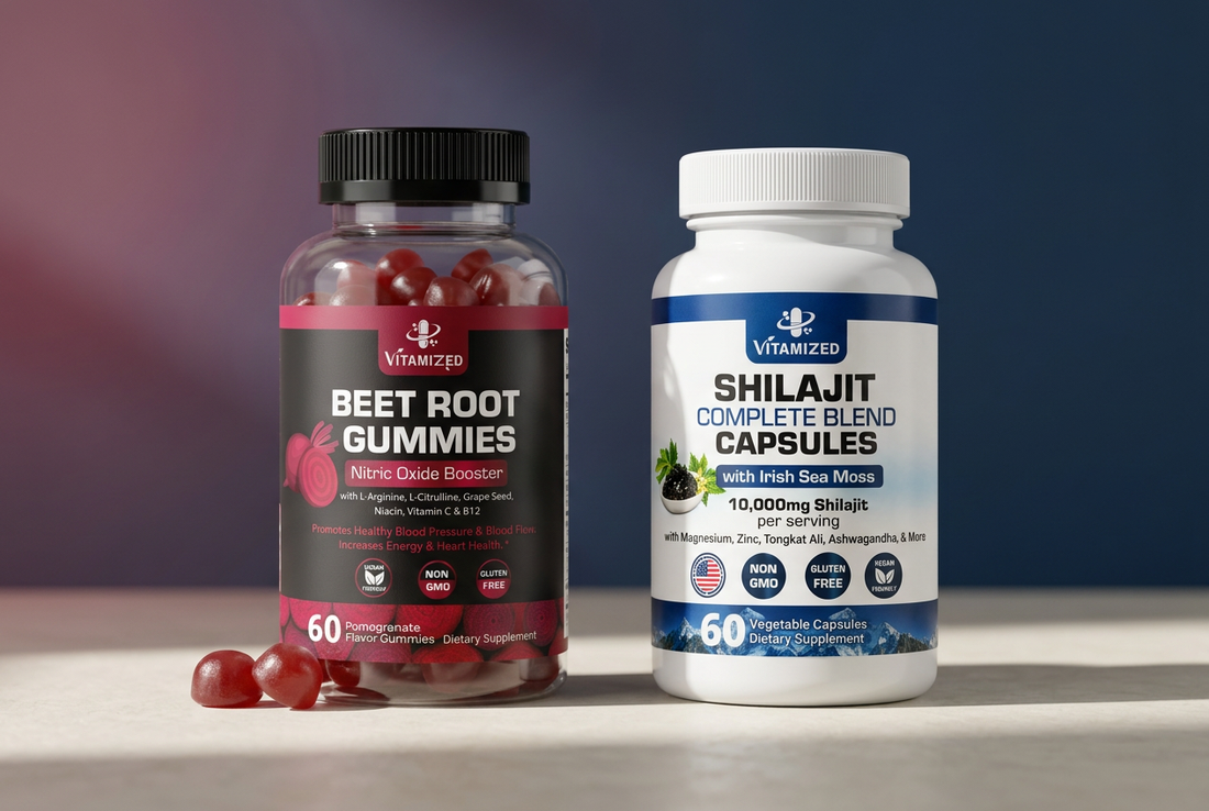 Vitamized Beet Root Gummies and Shilajit Complete Blend Capsules bottles arranged on an ivory surface against a softly lit blue and berry-rose background.