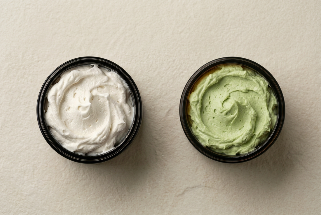 Open Wild Haven Skin Naked Whip and Matcha Whip jars showing ivory and pale green whipped textures on a warm ivory surface.