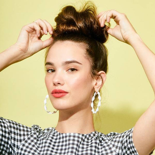 Copy this trendy hairstyle with JB MESSY BUN now