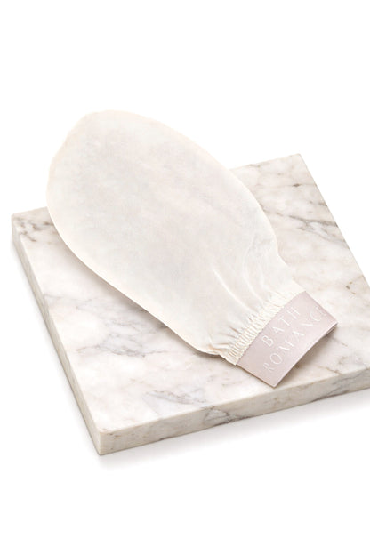 guante de baño de seda exfoliante