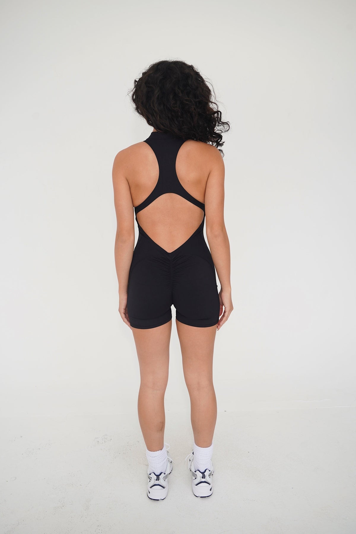 I am Limitless Zipper Bodysuit in Black