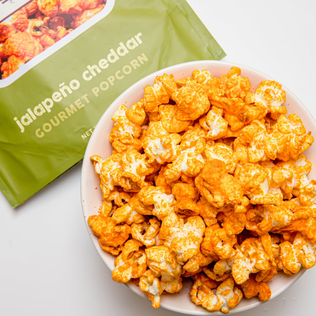 Palomitas de maíz con queso cheddar y jalapeño