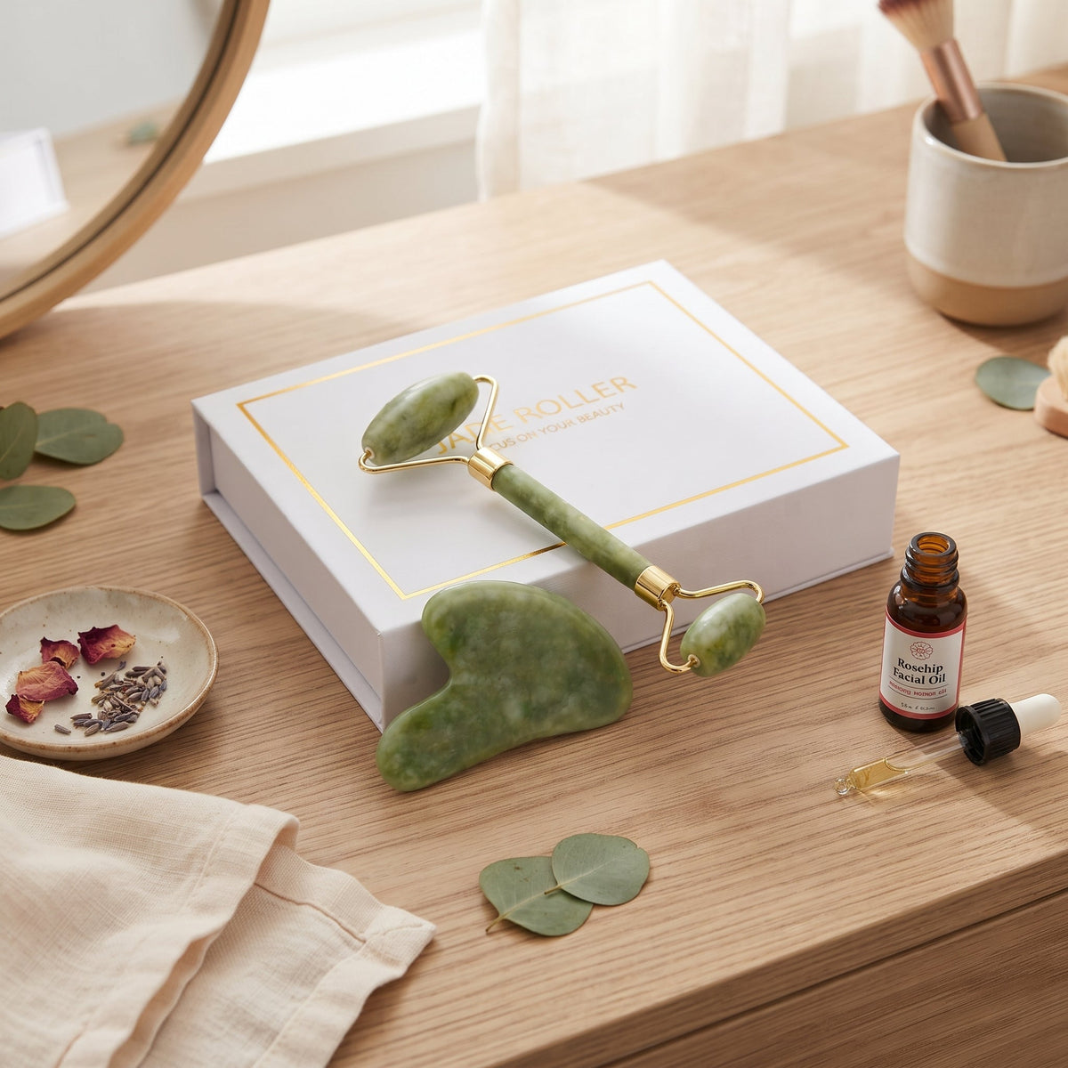 Caja de regalo con rodillo de jade y gua sha