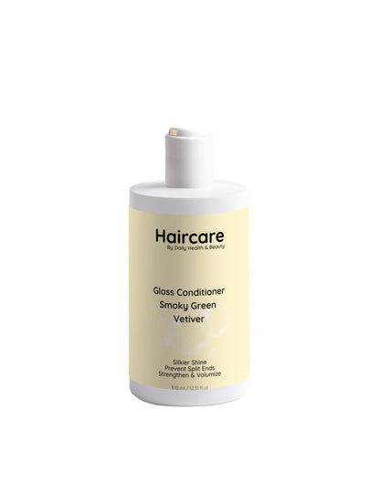 Haircare product bottle with yellow label on a white background