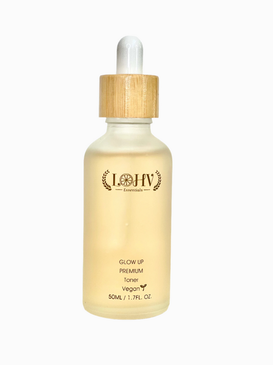 Suero tónico iluminador premium 100 % vegano con ácido hialurónico, niacinamida, hoja de camelia, vitamina E y agua de rosas.