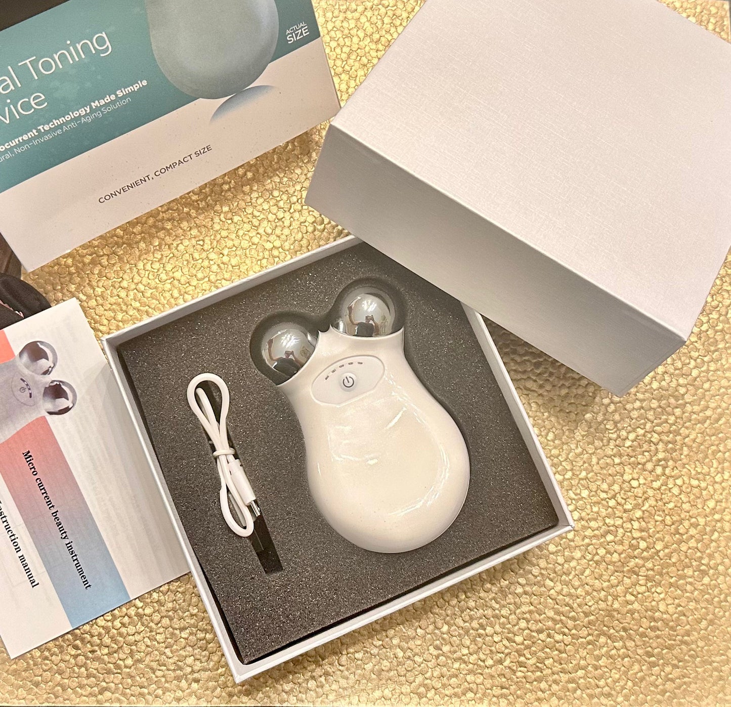 Masajeador facial tonificador de microcorriente
