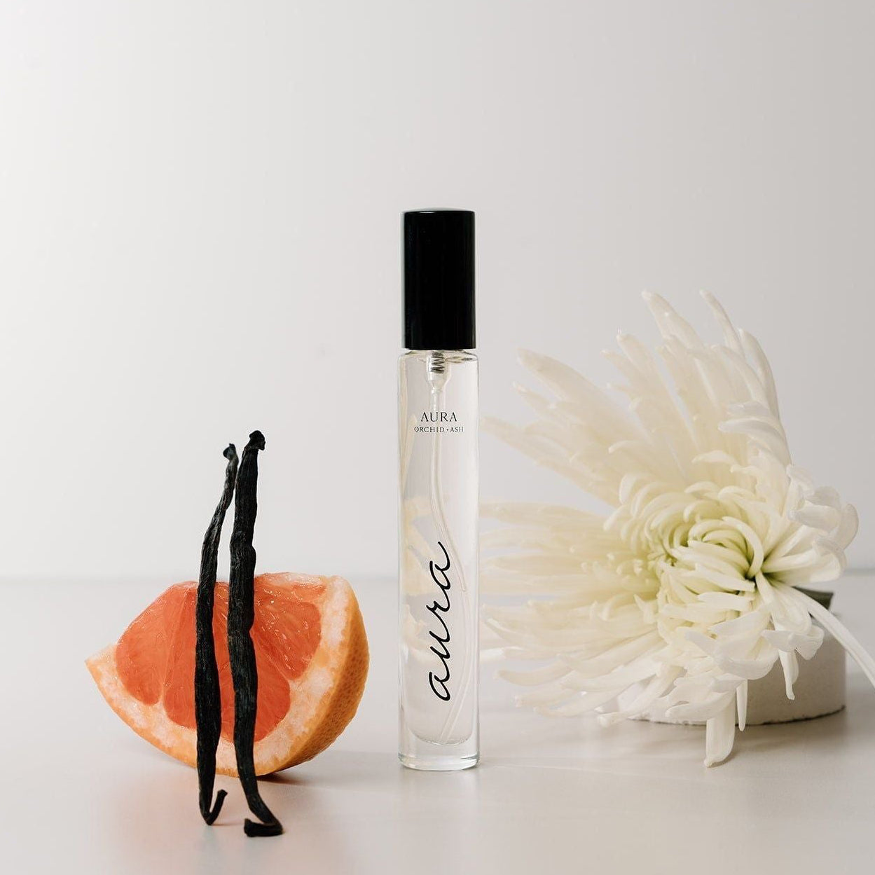 Perfume AURA en spray de viaje
