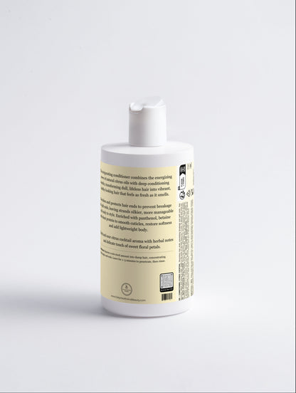 Fresh Conditioner Citrus Cocktail to hair ends for deep moisture and manageability.