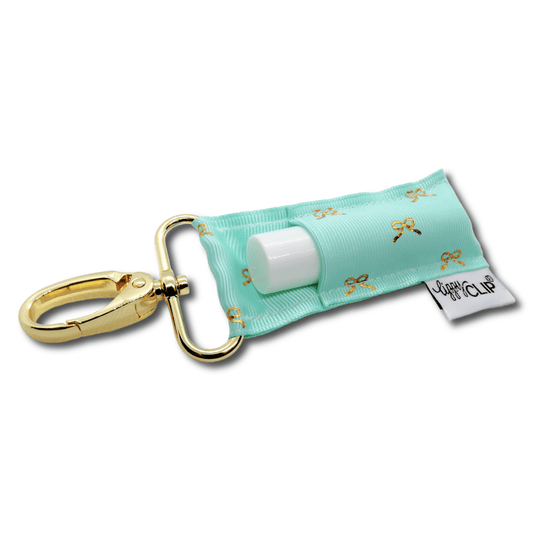 Gold Bows on Aqua LippyClip® Lip Balm Holder | Daily Health & Beauty