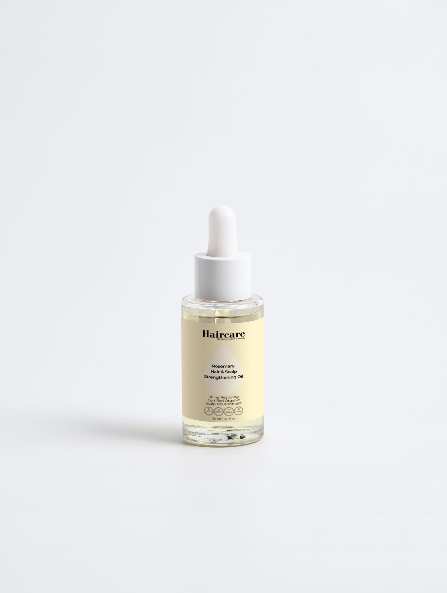 Rosemary Hair & Scalp Strengthening Oil in bathroom — organic rosemary & peppermint, pre-shampoo scalp treatment