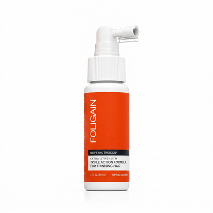 FOLIGAIN men's 10% TRIOXIDIL Complete Formula 59 mL bottle with white angled spray applicator.