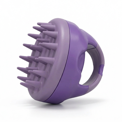 Close-up of the purple FOLIGAIN silicone scalp massager showing its conical bristles and curved finger grip.