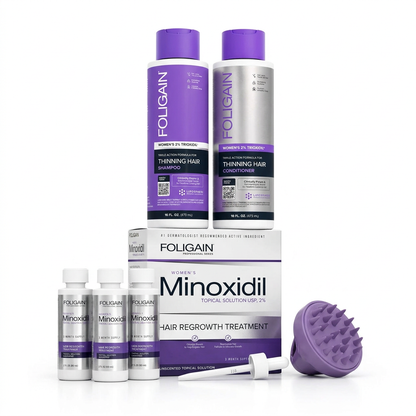 FOLIGAIN women's scalp care bundle showing three minoxidil bottles, dropper, carton, shampoo, conditioner and purple silicone massager.