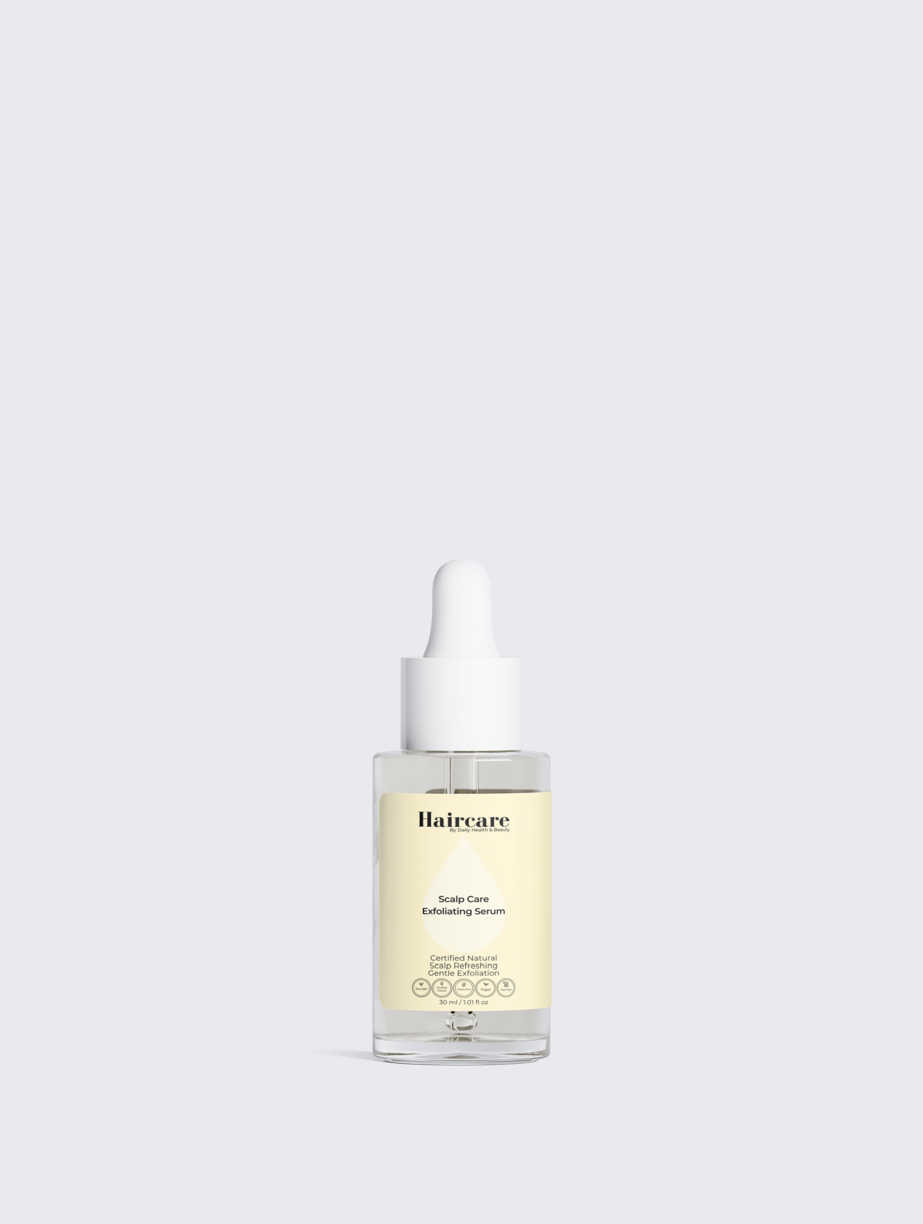 Applying Scalp Care Exfoliating Serum to dry scalp — gently exfoliates, relieves discomfort, supports fuller-looking hair