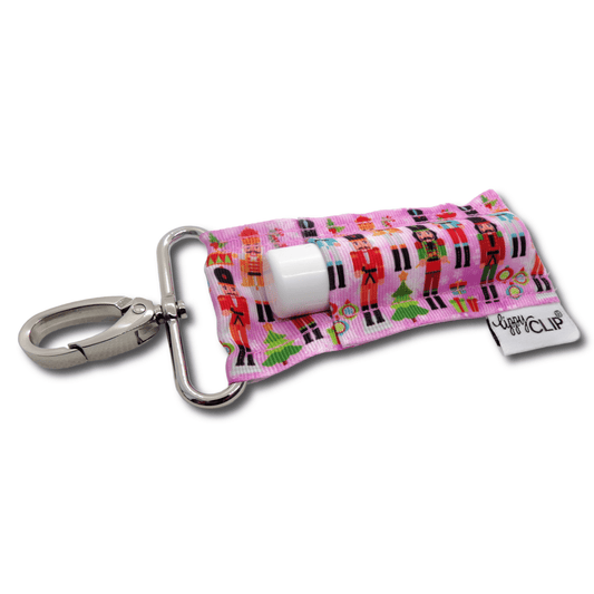 Pink Nutcracker LippyClip KISS for larger lip balms, essential oil rollers, etc. | Daily Health & Beauty