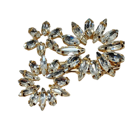 Broche éclat de cristal radieux
