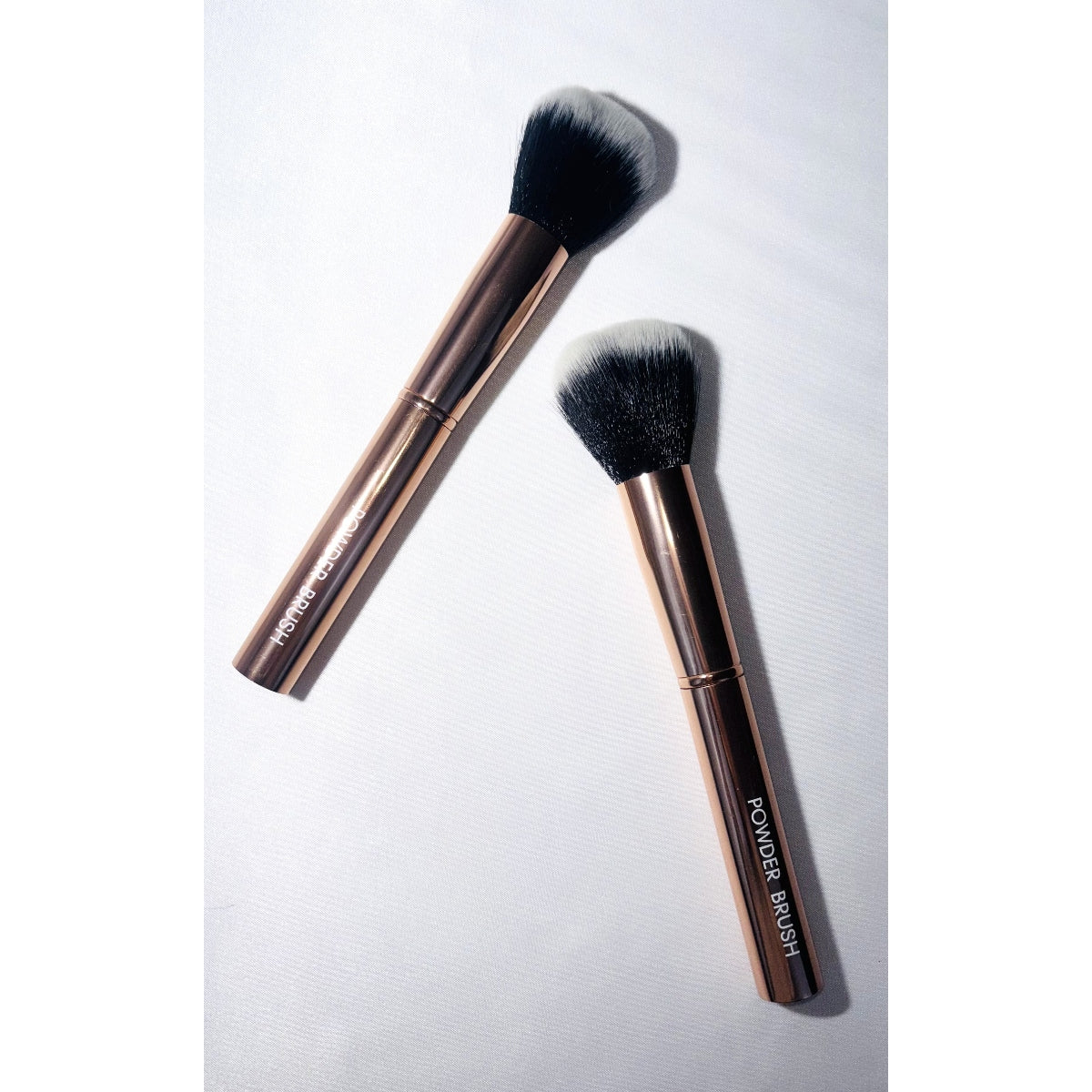 Brocha para polvos de oro rosa
