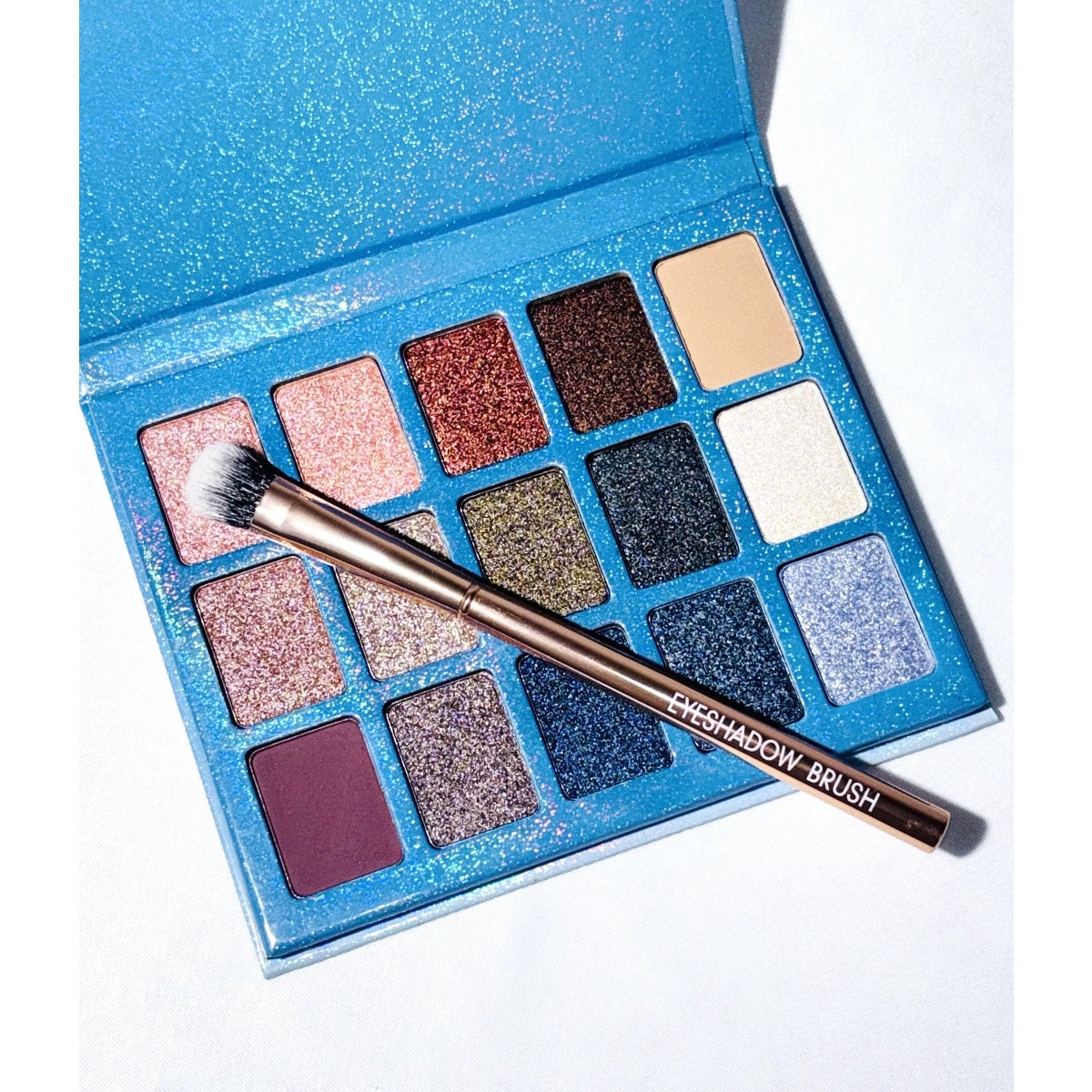 Pincel para sombras de ojos en oro rosa