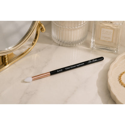 Petit applicateur en silicone pailleté
